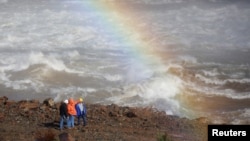 Water is released from the Lake Oroville Dam after an evacuation was ordered for communities downstream from the dam in Oroville, California, U.S., Feb. 14, 2017.