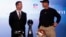 San Francisco 49ers head coach Jim Harbaugh (R) and his brother, Baltimore Ravens head coach John Harbaugh, appear at their joint press conference and stand next to the Vince Lombardi trophy ahead of the NFL's Super Bowl XLVII in New Orleans, Louisiana, F