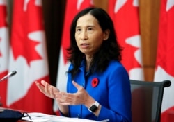 FILE - Canada's Chief Public Health Officer Dr. Theresa Tam speaks at a news conference held to discuss the country's coronavirus response in Ottawa, Ontario, Canada, Nov. 6, 2020.