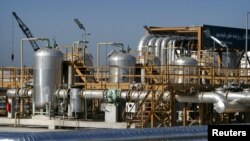 A general view of the Neka oil terminal 300 Kms North east of Tehran April 29, 2004. Under the CROS project inaugurated in the Caspian port of Neka, Iran will take crude oil from Russia, Kazakhstan and Turkmenistan and transfer them through pipelines to r