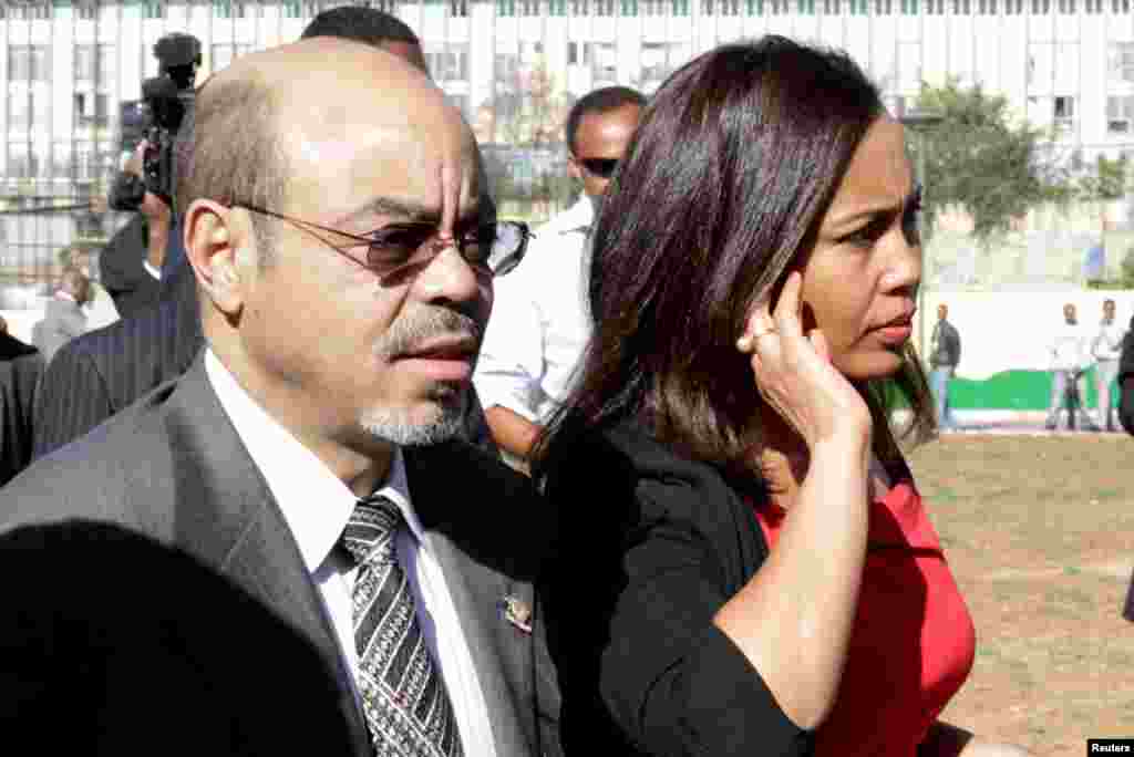 The late Ethiopian Prime Minister Meles Zenawi arrives with his wife Azeb Mesfi for the 18th African Union Summit in Addis Ababa, January 29, 2012.