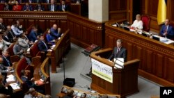 Ukrainian President Petro Poroshenko addresses parliament during its opening session in Kyiv, Ukraine, Sept. 6, 2016. Poroshenko has set both NATO and EU membership as strategic goals for Ukraine.