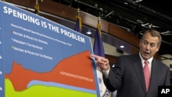 贝纳12月13日在国会记者会上谈论开支问题