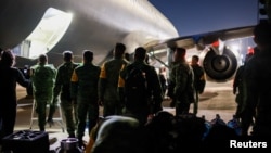 Mexican soldiers load supplies into an Air Force plane before departure with search and rescue teams to help in the aftermath of the earthquake in Turkey, at the Santa Lucia Military airbase, on the outskirts of Mexico City, Mexico Feb. 6, 2023. Mexico's Presidency/Handout via REUTERS