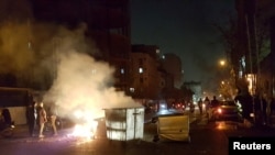 People protest in Tehran, Iran, Dec. 30, 2017, in this picture obtained from social media.