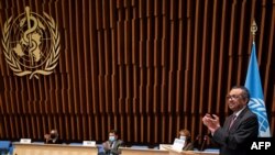 A handout photograph taken and released by the WHO on May 24, 2021, shows Director-General Adhanom Ghebreyesus delivering a speech during the World Health Assembly. (AFP photo / World Health Organization / Christopher Black)