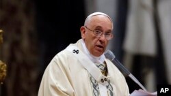 Pope Francis delivers a message as he celebrates an Armenian-Rite Mass to commemorate the 100th anniversary of the Armenian Genocide, in St. Peter's Basilica at the Vatican, April 12, 2015. 