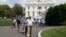 Members of the media, and others, are evacuated from the White House in Washington, June 9, 2015. 