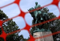 A statue of Confederate Gen. Robert E. Lee is shown in Market Street Park on July 9, 2021, in Charlottesville, Virginia.