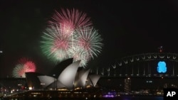 Fireworks over the Opera House and the Harbour Bridge in Sydney