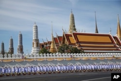 Thai officer stand outside Grand Palace in Bangkok, May 4, 2019.