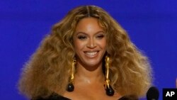 FILE - Beyonce appears at the 63rd annual Grammy Awards in Los Angeles on March 14, 2021. Beyoncé releases a concert film this week titled "Renaissance: A Film by Beyoncé"