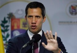 FILE - Venezuela's National Assembly President and self-proclaimed interim President Juan Guaido speaks to the press in Caracas, Venezuela, Sept. 16, 2019.
