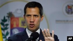 Venezuela's National Assembly President and self-proclaimed interim President Juan Guaido speaks to the press in Caracas, Venezuela, Sept. 16, 2019.