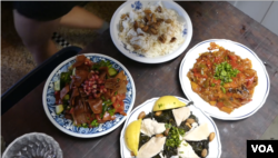Refugee cooks serve up a variety of dishes from their homelands during the Refugee Food Festival taking place in 13 European countries.