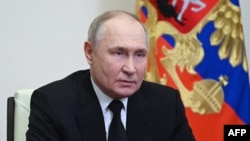 Ruski predsjednik Vladimir Putin tokom obraćanja poslije napada za koji je odgovornost preuzela teroristička organizacija Islamska država u kom je ubijeno 139 ljudi i povrijeđeno njih 182 (Foto: REUTERS/Maxim Shemetov) 
