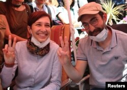 FILE - Nuriye Gulmen, a literature professor, and Semih Ozakca, a schoolteacher, have been on a hunger strike to protest the firing of educators in a crackdown following a failed coup against President Recep Tayyip Erdogan.