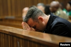 Former Paralympian Oscar Pistorius appears for sentencing for the murder of Reeva Steenkamp at the Pretoria High Court, South Africa, June 14, 2016.