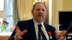 FILE - U.S. movie mogul Harvey Weinstein is seen during an interview in Paris, March 7, 2012, the same day he was named Chevalier of the Legion of Honor by then French president Nicolas Sarkozy.