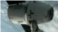 The SpaceX Dragon commercial cargo craft after it was grappled and connected to the International Space Station, May 25, 2012. (AP/NASA)