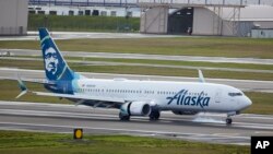 Alaska Airlines flight 337 from Fort Lauderdale, Florida. a Boeing 737-900, lands at Portland International Airport in Portland, Oregon, Jan. 6, 2024.