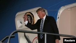 U.S. President Donald Trump arrives aboard Air Force One at Ninoy-Aquino International Airport in Manila, Philippines November 12, 2017. 