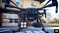 This 2018 photo provided by the Menlo Fire UAS shows a DJI drone with a thermal-imaging camera designed by FLIR Systems in Menlo Park, Calif.