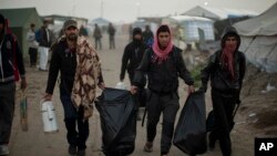 Migranti (AP Photo/Emilio Morenatti)