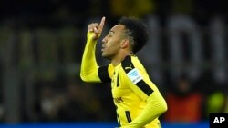 A girl poses for a photo during a visit to the Instagram museum &quot;Smile Safari&quot; that recently opened in Brussels, Belgium.