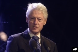 Former President Bill Clinton speaks during a rally in Tel Aviv, Israel, marking 20 years since the assassination of Israeli Prime Minister Yitzhak Rabin, Oct. 31, 2015.