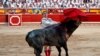 FILE - Spanish bullfighter Octavio Chacon performs a pass to a bull during the last bullfight of the San Fermin festival in Pamplona, Spain, July 14, 2019. 
