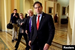 FILE - Senator Marco Rubio (R-FL) arrives at the U.S. Capitol in Washington, Nov. 16, 2016.