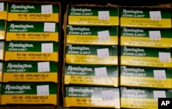 In this Thursday, March 1, 2018, photo Remington rifle ammunition is shown at Duke's Sport Shop in New Castle, Pa.