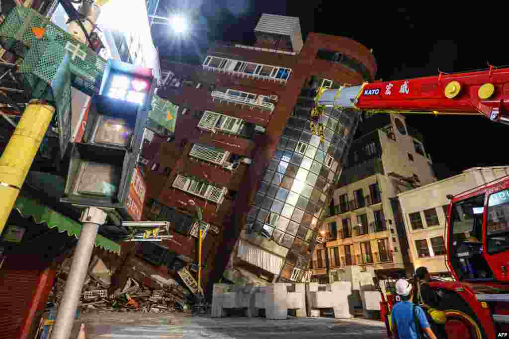 This photo taken by Taiwan's Central News Agency (CNA) on April 3, 2024 shows the damaged Uranus Building in Hualien, after a major earthquake hit Taiwan's east.
