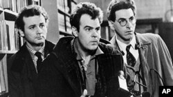 FILE - In an undated file photo, Bill Murray, Dan Aykroyd, center, and Harold Ramis, right, appear in a scene from the 1984 movie "Ghostbusters." 