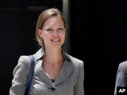 FILE - Legal Aid Society lawyer Jennifer WIlliams walks outside the offices of the Immigration and Customs Enforcement in New York, June 8, 2018.