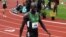 Lopez Lomong finished third in the 5,000-meter race at the 2012 US Olympic Trials in Eugene, Oregon last month. (T. Banse/VOA) 