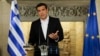 In this photo released by Greek Prime Minister's office, Greek Prime Minister Alexis Tsipras speaks during a televised address to the nation, in Athens, June 12, 2018. 
