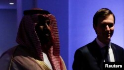 FILE - Saudi Arabia's Prince Mohammed bin Salman escorts White House senior advisor Jared Kushner at the Global Center for Combatting Extremist Ideology in Riyadh, Saudi Arabia May 21, 2017. 