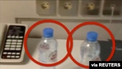 Water bottles are seen in a hotel room where Kremlin critic Alexei Navalny stayed during his recent visit in the Siberian city of Tomsk, on this still image from a social media video obtained by Reuters Sept. 17, 2020. (Instagram @Navalny)
