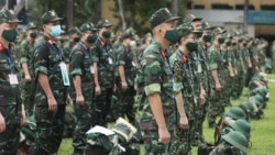 Army soldiers line up during a ceremony to send off military doctors to Ho Chi Minh City to help with treating COVID-19 patients in Hanoi, Vietnam, Monday, Aug. 23, 2021. (Bui Cuong Quyet/VNA via AP)