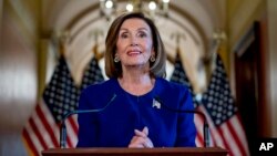 House Speaker Nancy Pelosi reads a statement announcing an official impeachment inquiry into President Donald Trump, on Capitol Hill in Washington, Tuesday, Sept. 24, 2019. (AP Photo) 