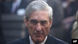 An artwork called &quot;Beyond Crisis&quot; by French artist Guillaume Legros aka Saype and created with an eco paint made out of chalk and coal over a 3000 sqm field is pictured in Leysin, Switzerland.