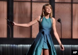 Taylor Swift presents the award for best new artist at the 57th annual Grammy Awards on Feb. 8, 2015, in Los Angeles.
