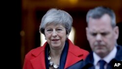 Britain's Prime Minister Theresa May leaves 10 Downing Street to make a statement to the Houses of Parliament in London, Feb. 26, 2019.