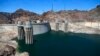 FILE - The low level of the water line is shown on the banks of the Colorado River at the Hoover Dam in Hoover Dam, Arizona, May 31, 2018.