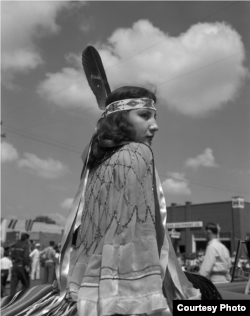 Eula Mae Narcomey Doonkeen (Seminole) in the American Indian Exposition Parade. Andarko, Oklahoma, ca. 1952. 45EXCW6. © 2014 Estate of Horace Poolaw. Reprinted with permission.