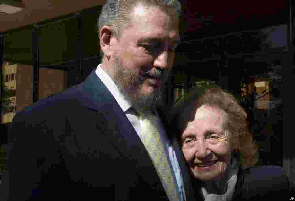 Fidel Castro Diaz-Balart, son of Cuba's former President Fidel Castro and senior researcher and professor of the Cuban Academy of Sciences meets his mother, Mirta Diaz-Balart, during the opening session of a scientific seminar in Havana, Nov. 14, 2008.