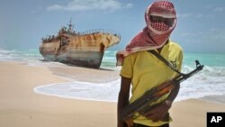 A train leaves the main train station after the sun sets in Frankfurt, Germany.