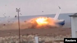 An Azerbaijan Airlines passenger plane crashes near Aktau, Kazakhstan, on Dec. 25, 2024, in this image from video. (Social media via Reuters)